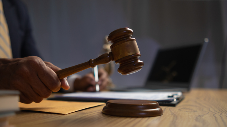 a judge gavel is prepared in the courtroom to be used to give a signal when the verdict is read after the trial is completed concept judge gavel is prepared to symbolize the decision in a court case